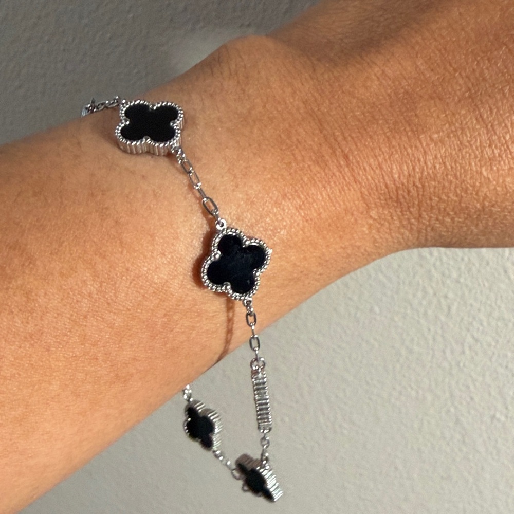 Elegant Silver and Black Clover Bracelet